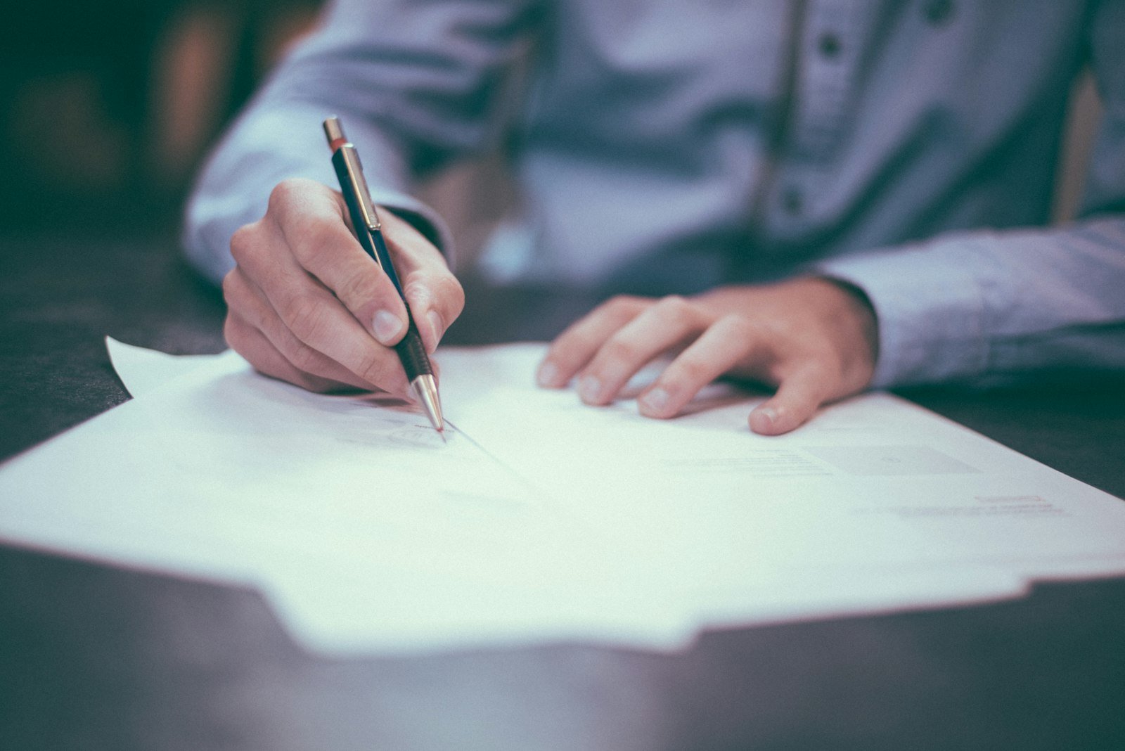 People reviewing paperwork together