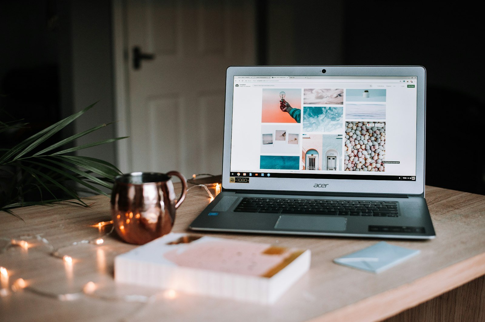 A calm kitchen table with a laptop and coffee, remote-work vibe